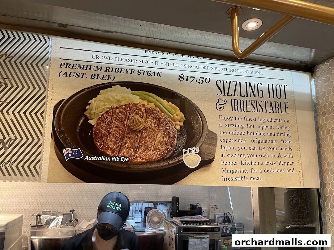 A promotional image for Pepper Kitchen's Premium Ribeye Steak.