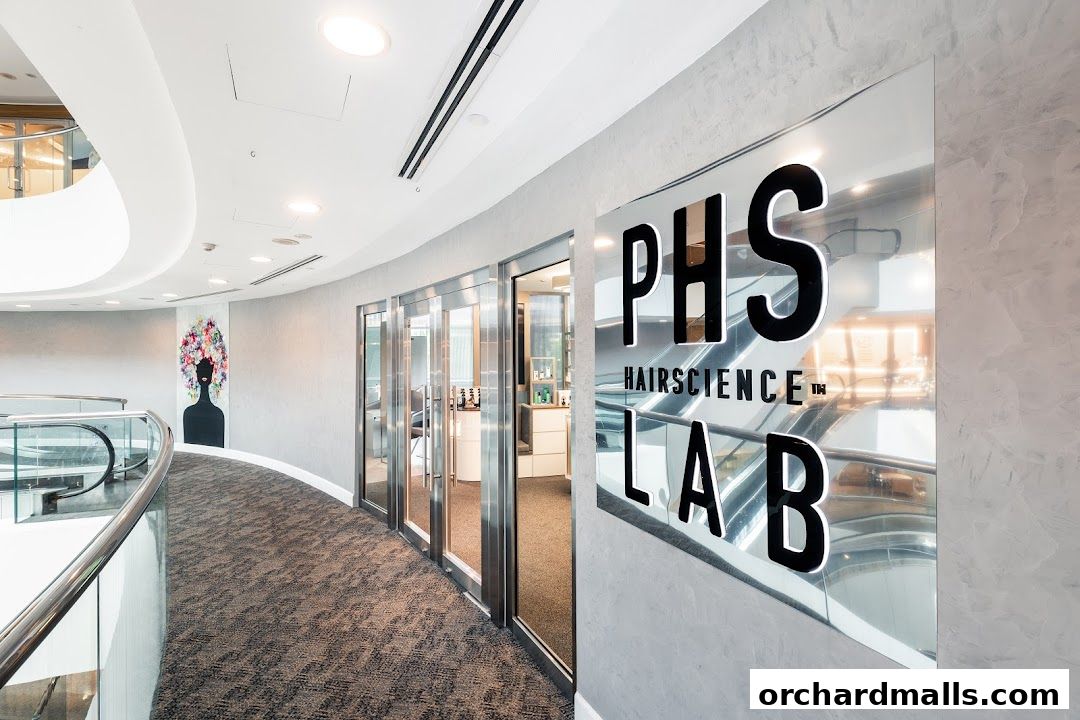 Entrance to PHS HAIRSCIENCE LAB with modern signage and interior view.