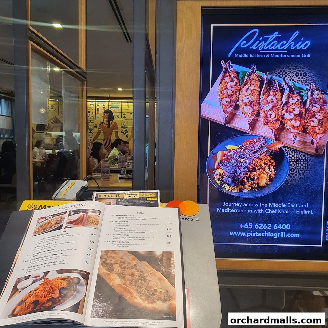 An open menu for Pistachio Middle Eastern & Mediterranean Grill with food images and prices.