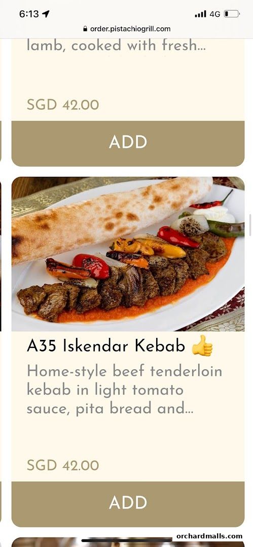 A screenshot of a menu showing Iskendar Kebab with price and description.