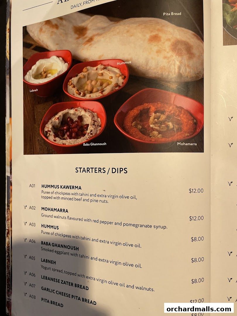A menu page featuring various Mediterranean dips and breads with prices.