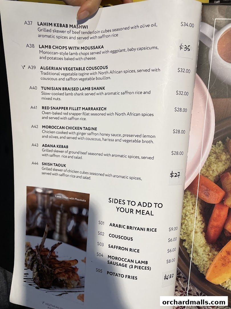 A menu from Pistachio Middle Eastern Mediterranean Grill featuring main courses and sides.