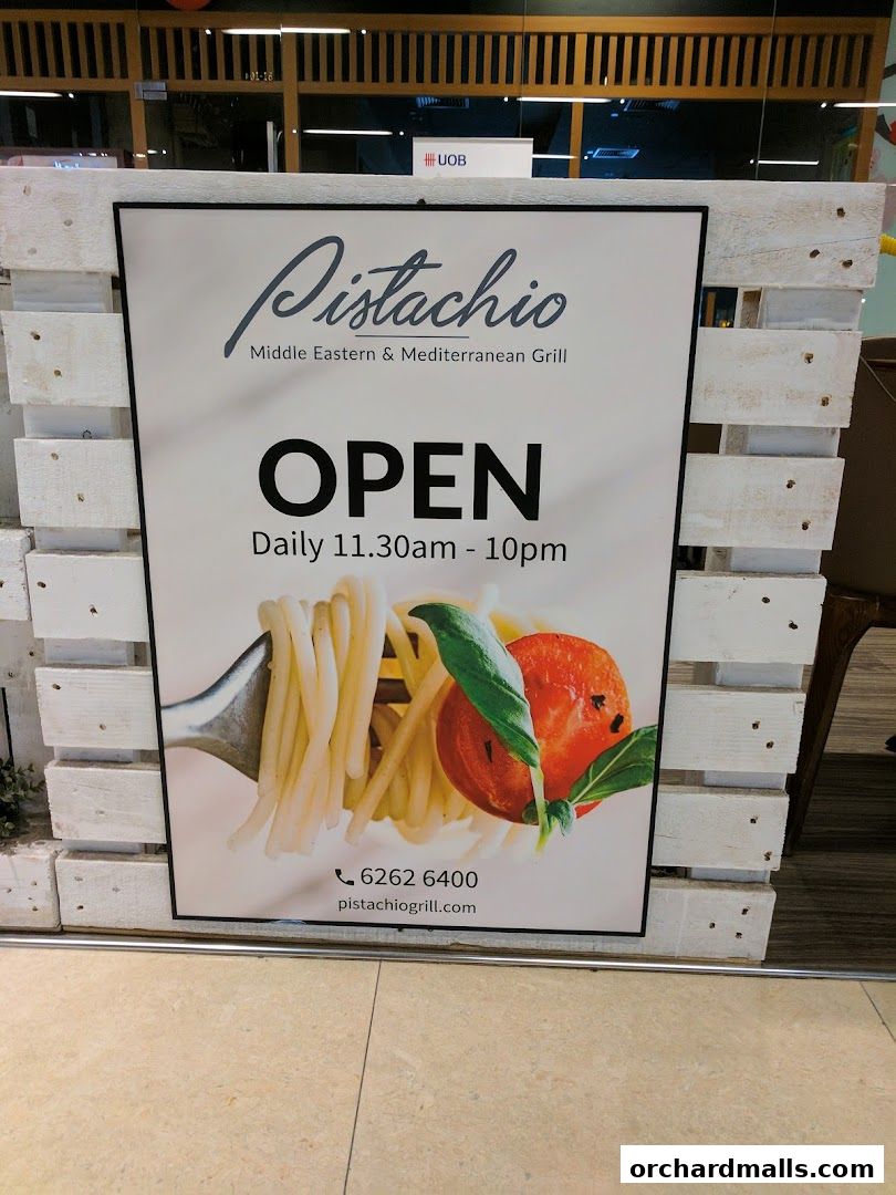 A sign for Pistachio Middle Eastern & Mediterranean Grill, showing it is open daily.