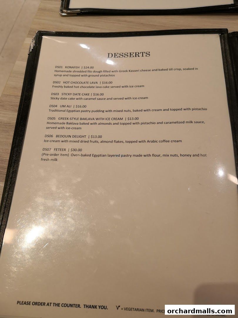 A menu page from Pistachio Middle Eastern Mediterranean Grill featuring desserts.