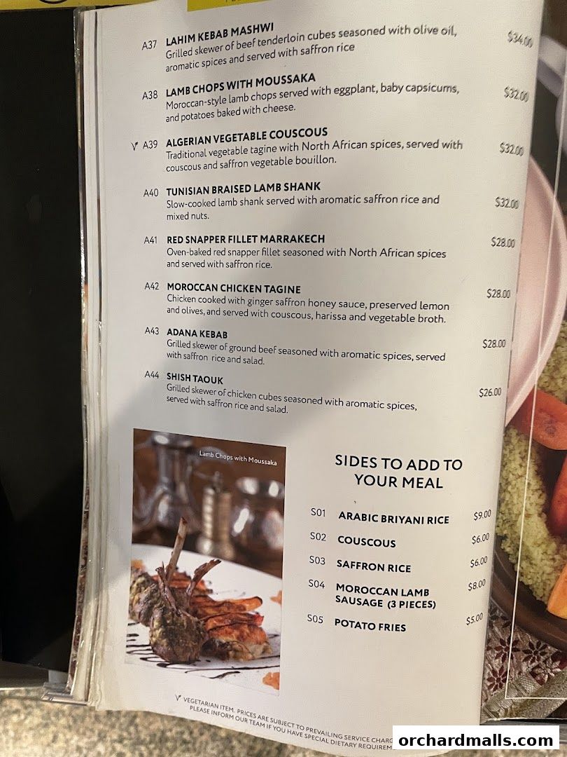 A menu from Pistachio Middle Eastern Mediterranean Grill featuring main courses and sides.