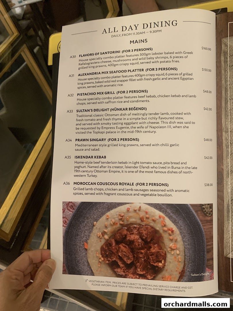 A menu from Pistachio Middle Eastern Mediterranean Grill featuring main courses.