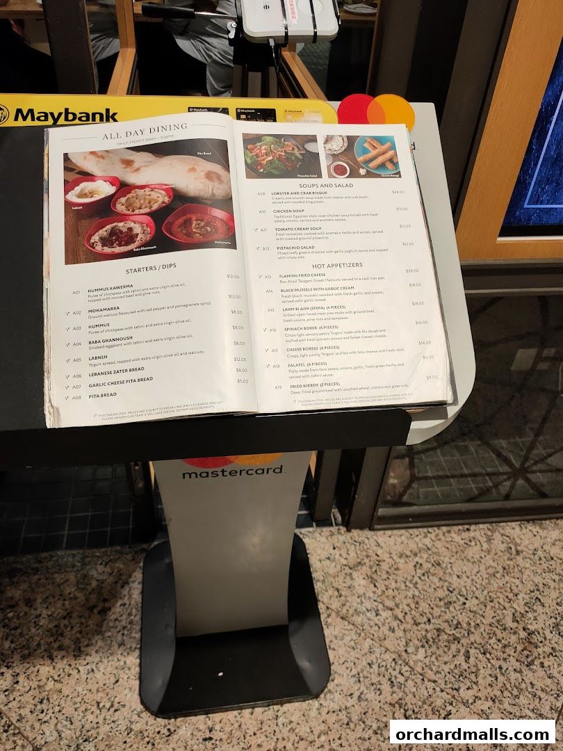 A menu from Pistachio Middle Eastern Mediterranean Grill with starters, dips, soups, salads, and hot appetizers.
