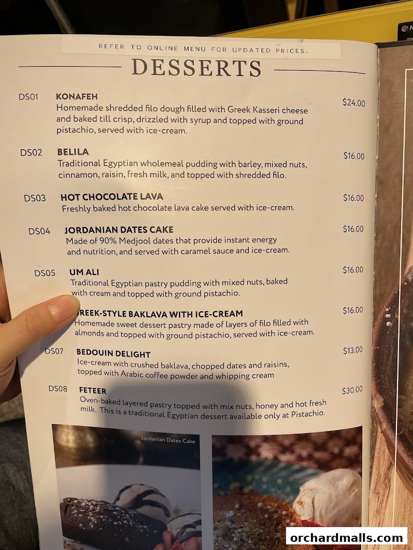 A menu page displaying various Middle Eastern and Mediterranean desserts with descriptions and prices.