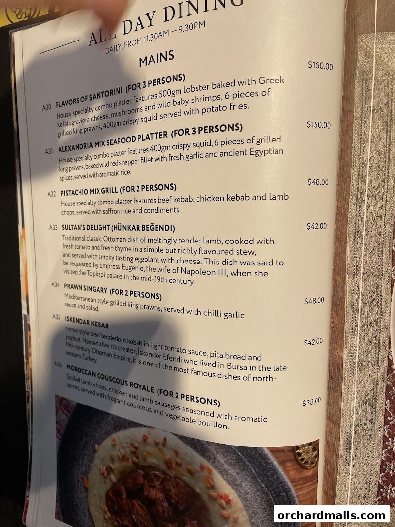 A menu page from Pistachio Middle Eastern Mediterranean Grill featuring main courses.