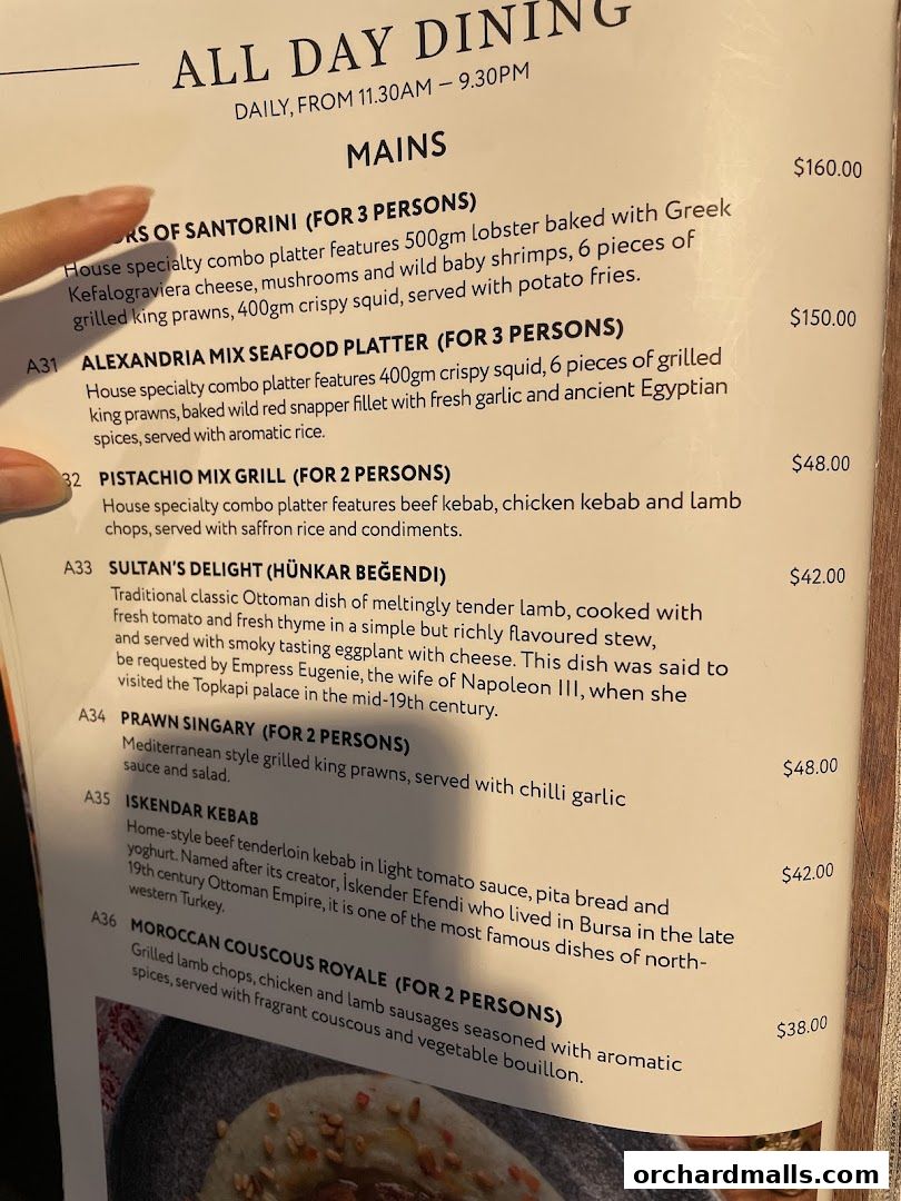 A menu from Pistachio Middle Eastern Mediterranean Grill featuring main courses.