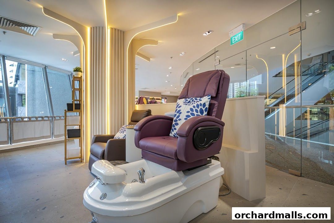 Luxurious pedicure chairs with foot baths in a modern, well-lit nail spa.