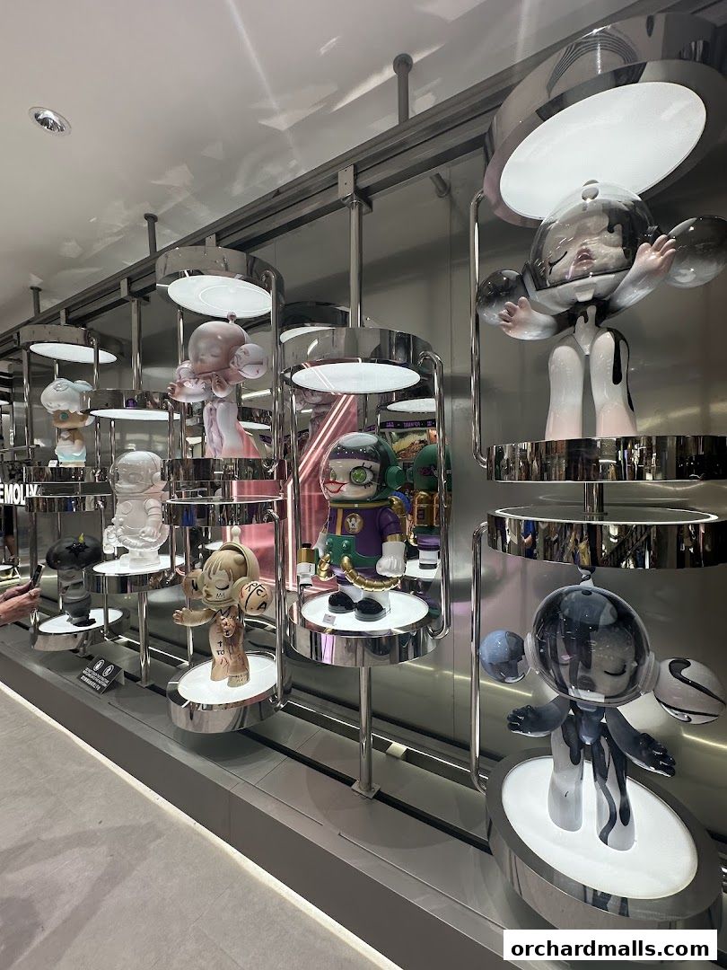 Display of unique designer toys in a modern, well-lit retail setting.
