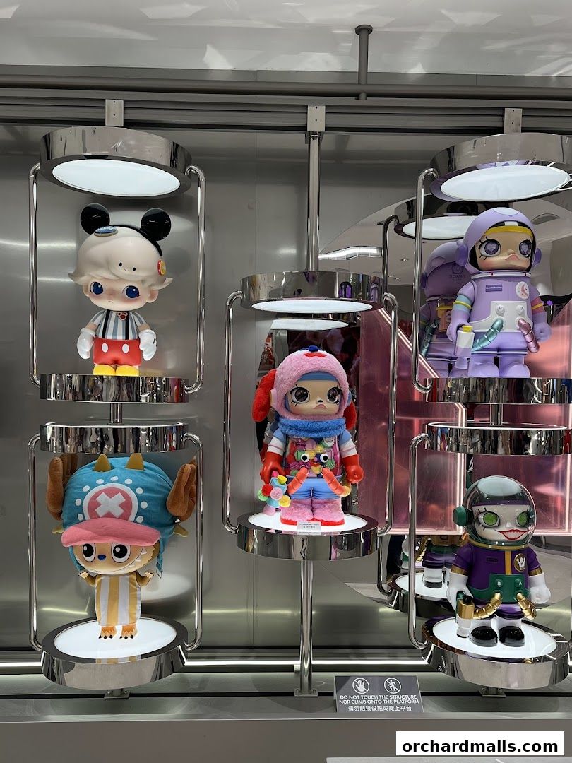 Display of collectible designer toys in a modern retail setting.