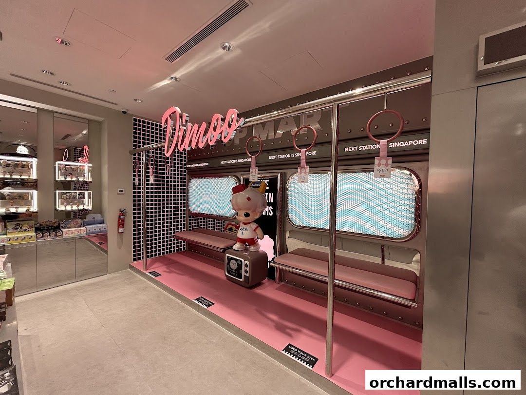 POP MART store interior with a Dimoo-themed subway train display and merchandise.