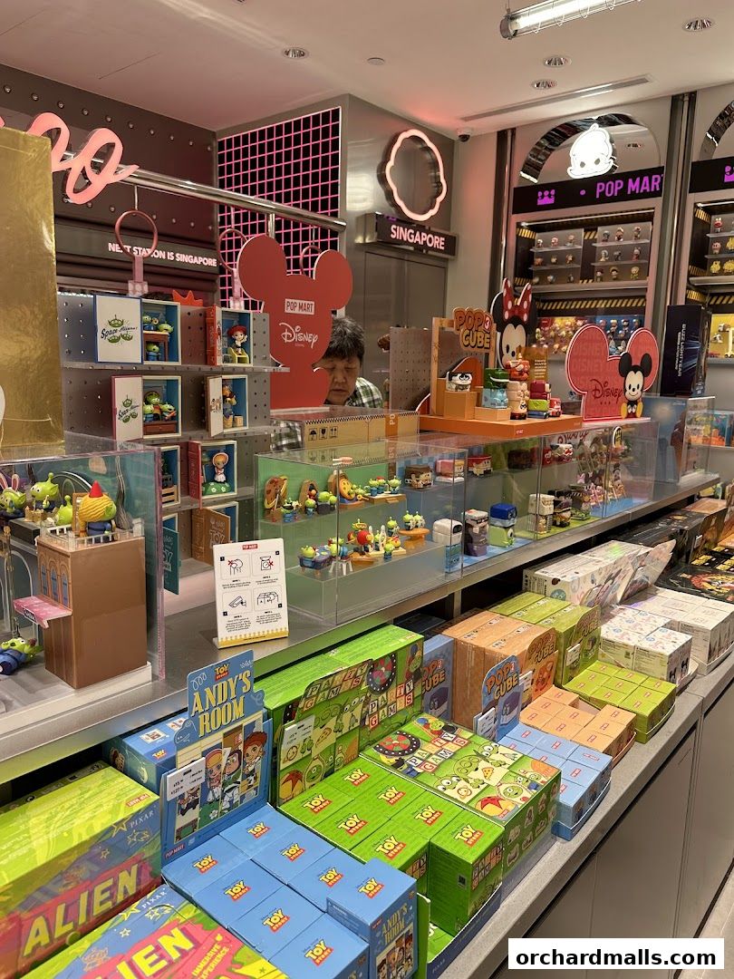 A POP MART store interior showcasing various collectible toys, including Disney and Toy Story merchandise.