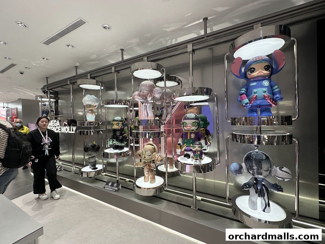 A display of collectible designer toys in a retail store.