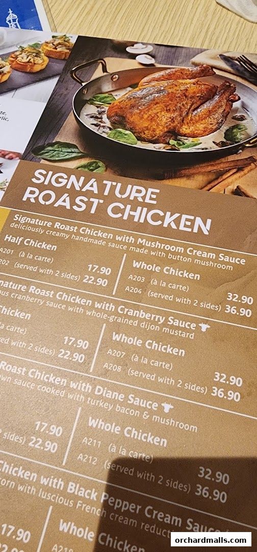 A menu featuring signature roast chicken dishes with various sauces and pricing.