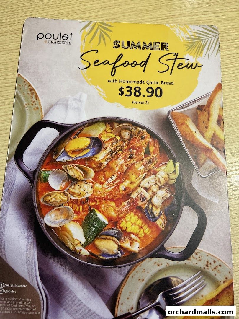A menu featuring Poulet + Brasserie's Summer Seafood Stew with homemade garlic bread.