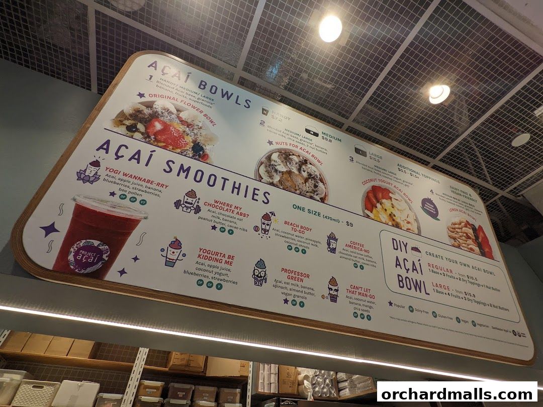 A menu board for Project Acai featuring acai bowls and smoothies with colorful illustrations.