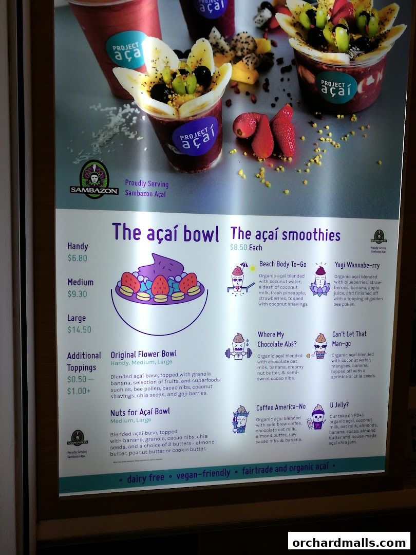 A menu board for Project Acai featuring acai bowls and smoothies with vibrant images.