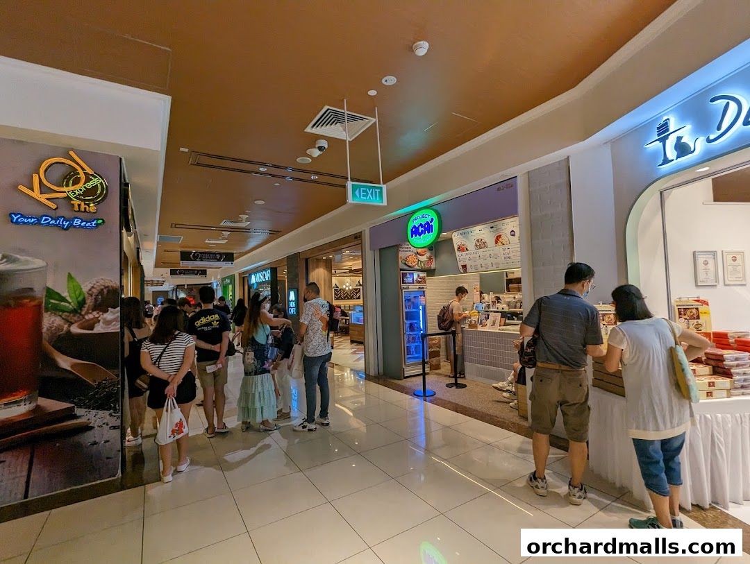 People queuing at Project Acai Ngee Ann City, a healthy food and drink shop.