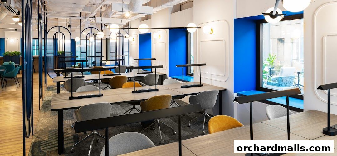 Modern co-working space with individual desks, chairs, and stylish lighting.