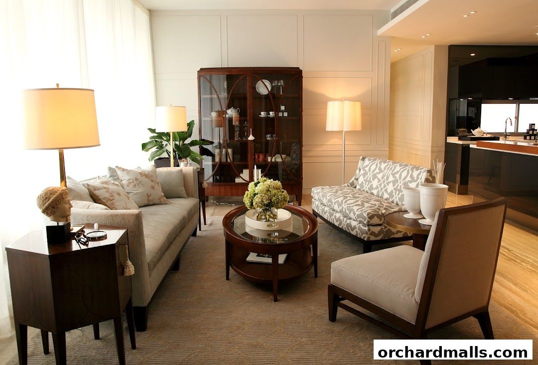 A stylish living room with sofas, a coffee table, and a display cabinet.