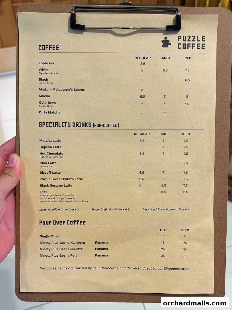 A menu from Puzzle Coffee featuring coffee, specialty drinks, and pour-over options.