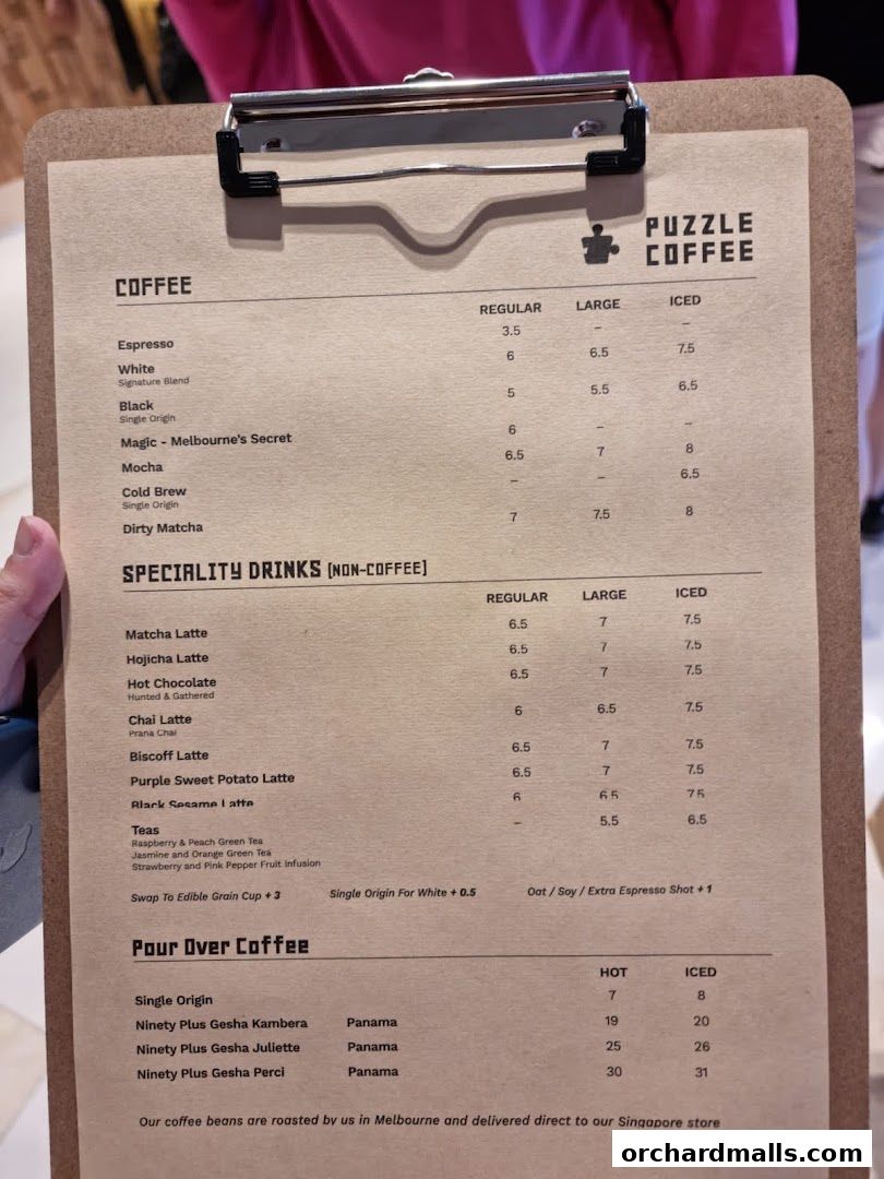A menu for Puzzle Coffee featuring various coffee and specialty drinks with prices.