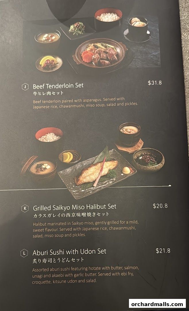 A menu featuring Japanese sets including Beef Tenderloin, Grilled Halibut, and Aburi Sushi.