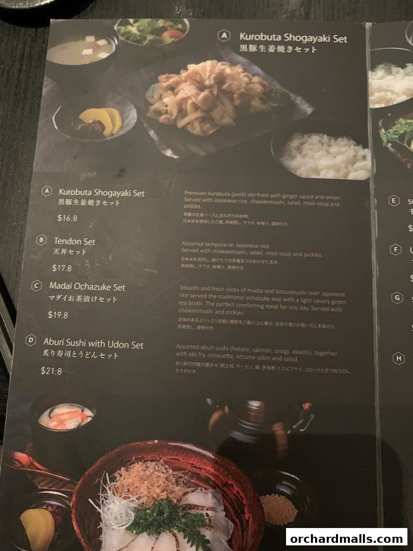 A menu featuring Japanese sets including Kurobuta Shogayaki, Tendon, Madai Ochazuke, and Aburi Sushi.