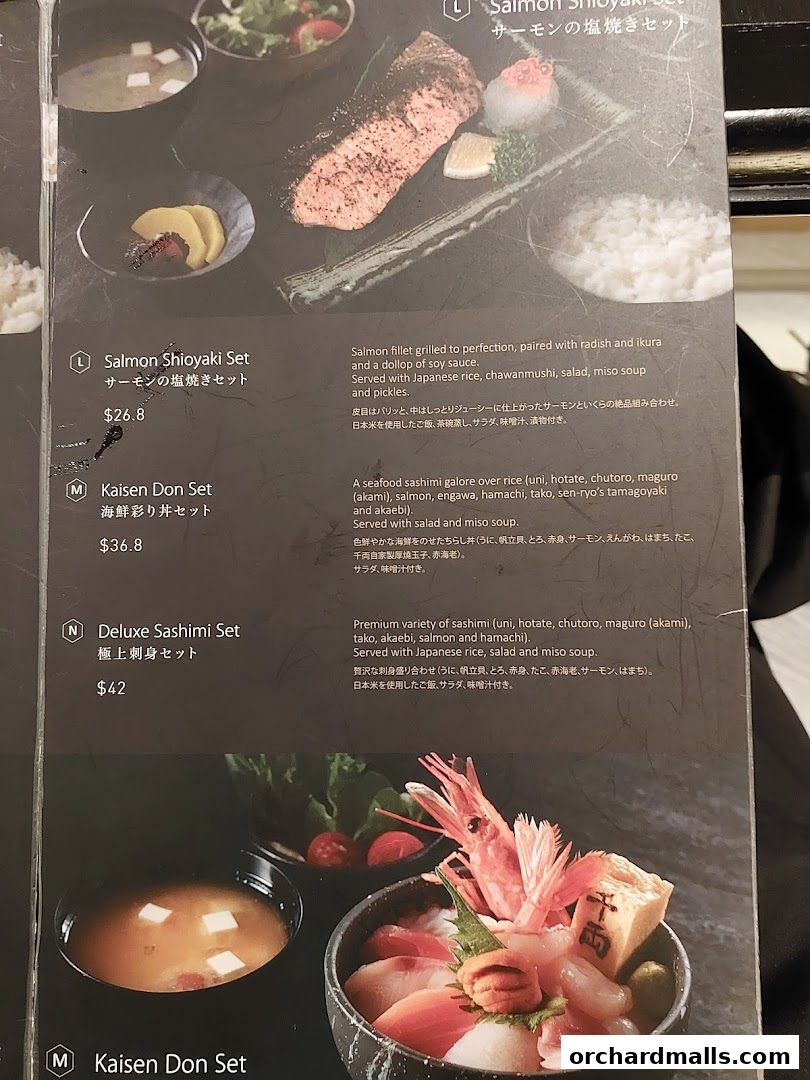 A menu showcasing Japanese seafood dishes with detailed descriptions and prices.