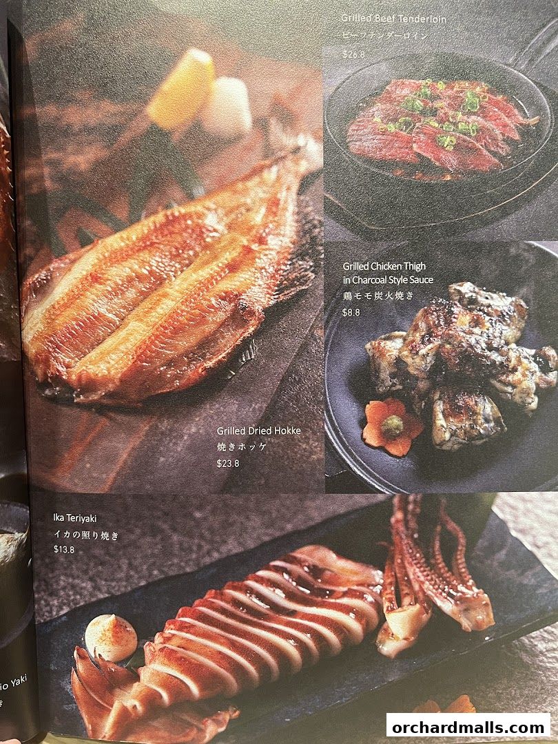 A menu page showcasing various grilled Japanese dishes with appetizing food photography.