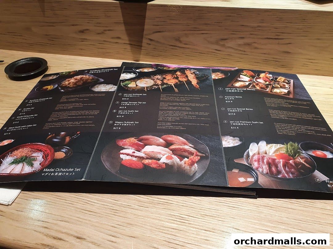 A menu from Sen-ryo restaurant featuring various Japanese sets and sushi.