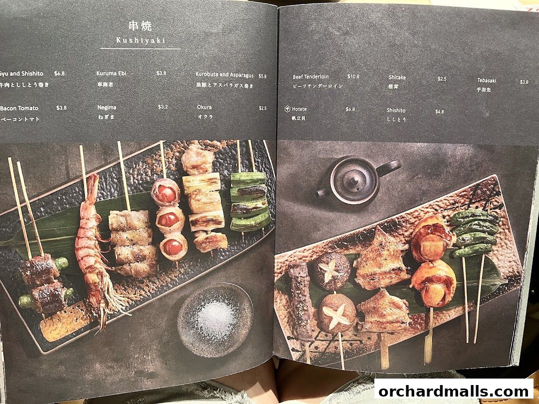 A menu showcasing various Kushiyaki skewers with accompanying images.