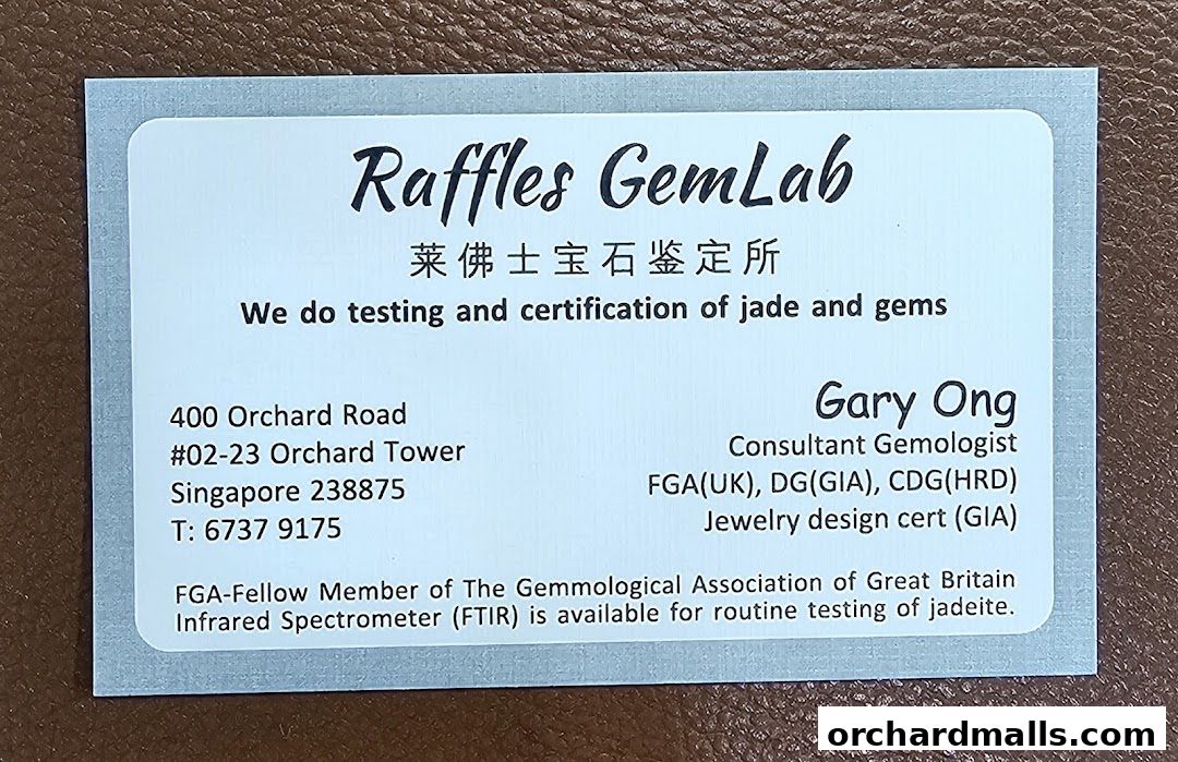Business card for Raffles GemLab, offering jade and gem testing and certification services.