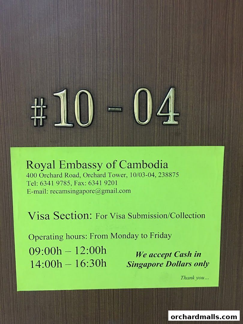 Sign for the Royal Embassy of Cambodia Visa Section with operating hours and contact details.