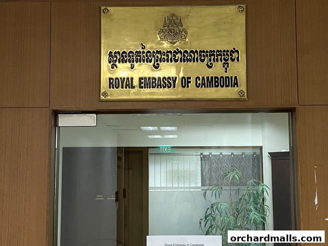 The entrance to the Royal Embassy of Cambodia with a prominent brass sign.