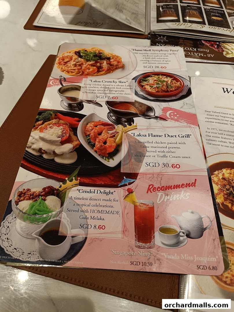 A menu from Royal Host Takashimaya S.C. featuring pasta, salads, grilled dishes, desserts, and drinks.