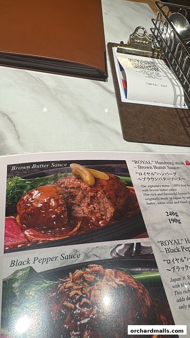 A menu page from Royal Host Takashimaya S.C. featuring hamburg steaks.