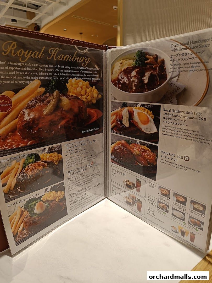 A menu from Royal Host Takashimaya S.C. featuring various hamburger steak dishes and sets.
