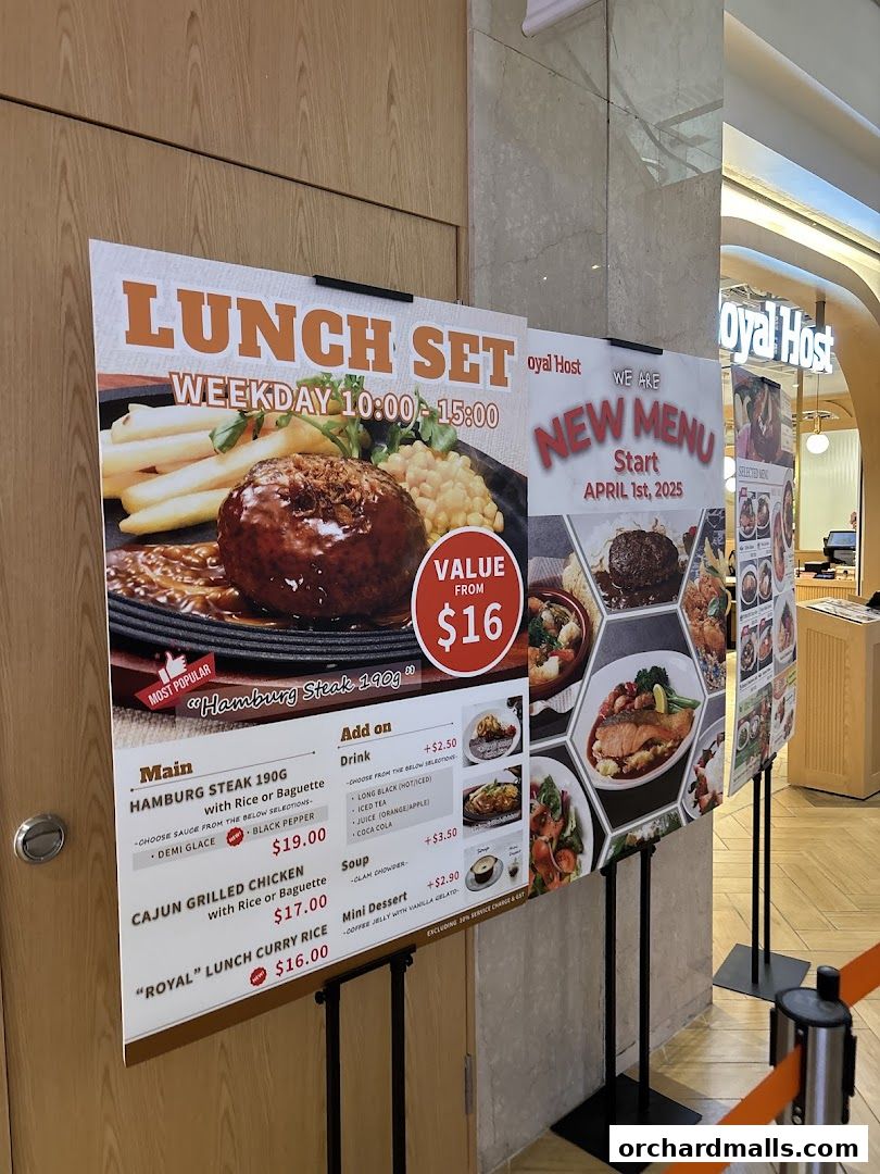 A display board showcasing lunch sets and a new menu for Royal Host.