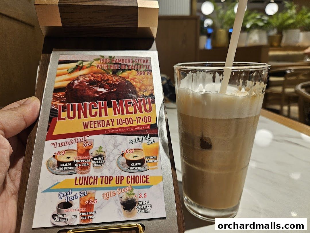 A lunch menu featuring a hamburger steak, set meals, and drink options.