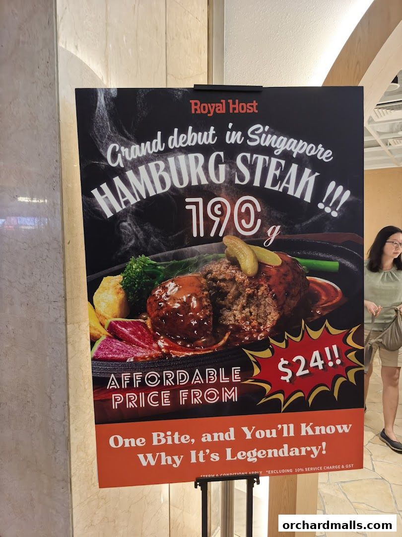 A poster advertising Royal Host's Hamburg Steak, highlighting its grand debut and affordable price.