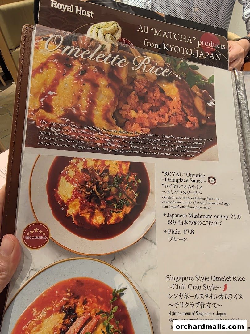 A menu featuring Omelette Rice dishes from Royal Host, highlighting signature options.