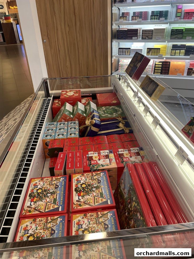 A display of festive gift boxes and chocolates from Royce, likely for the holiday season.