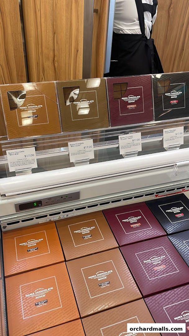 Display of various Royce Nama Chocolate boxes in different flavors and colors.