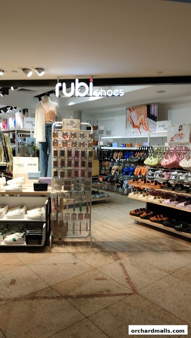 Interior view of Rubi Shoes store showcasing a variety of footwear and accessories.