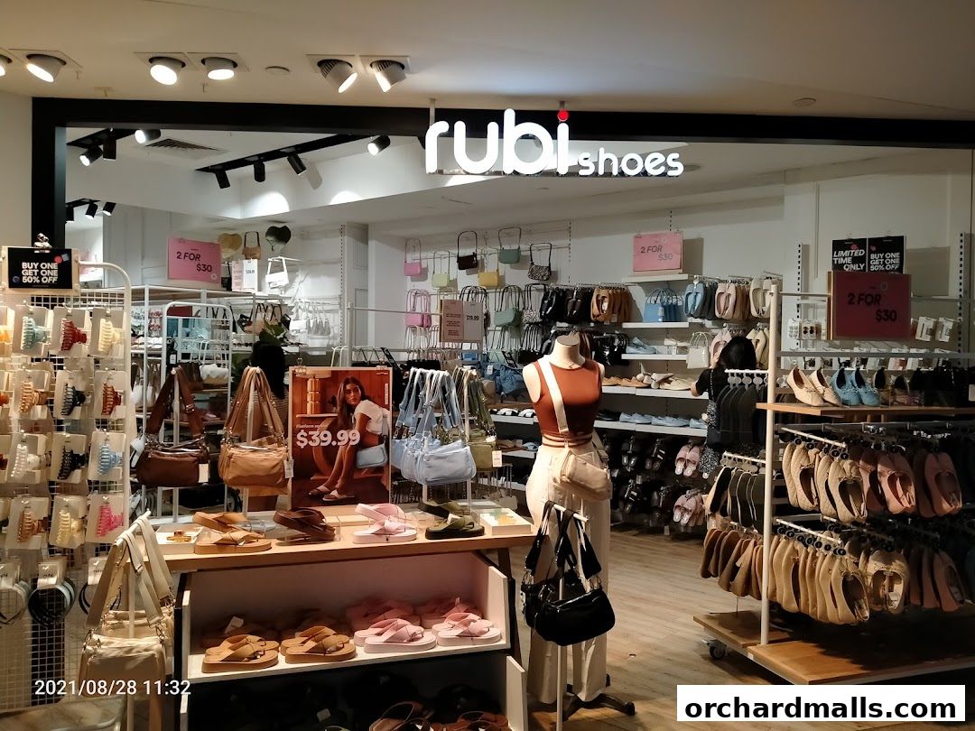 Interior view of Rubi Shoes store showcasing a variety of footwear and accessories.