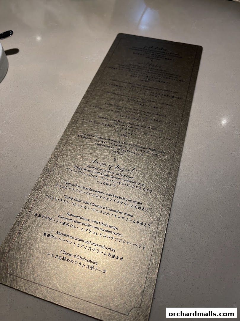 A menu from Sage by Yasunori Doi featuring desserts and cheese.